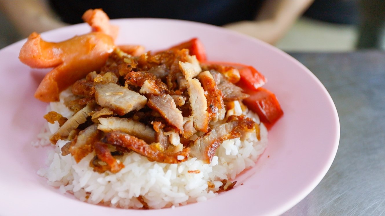 Plate Of Fried Pork With Sausages And Rice 